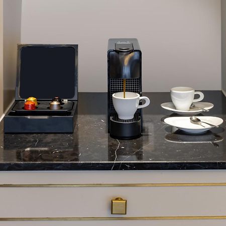 Melia Vinpearl Hue Hotel Luaran gambar A Nespresso coffee machine in a hotel room