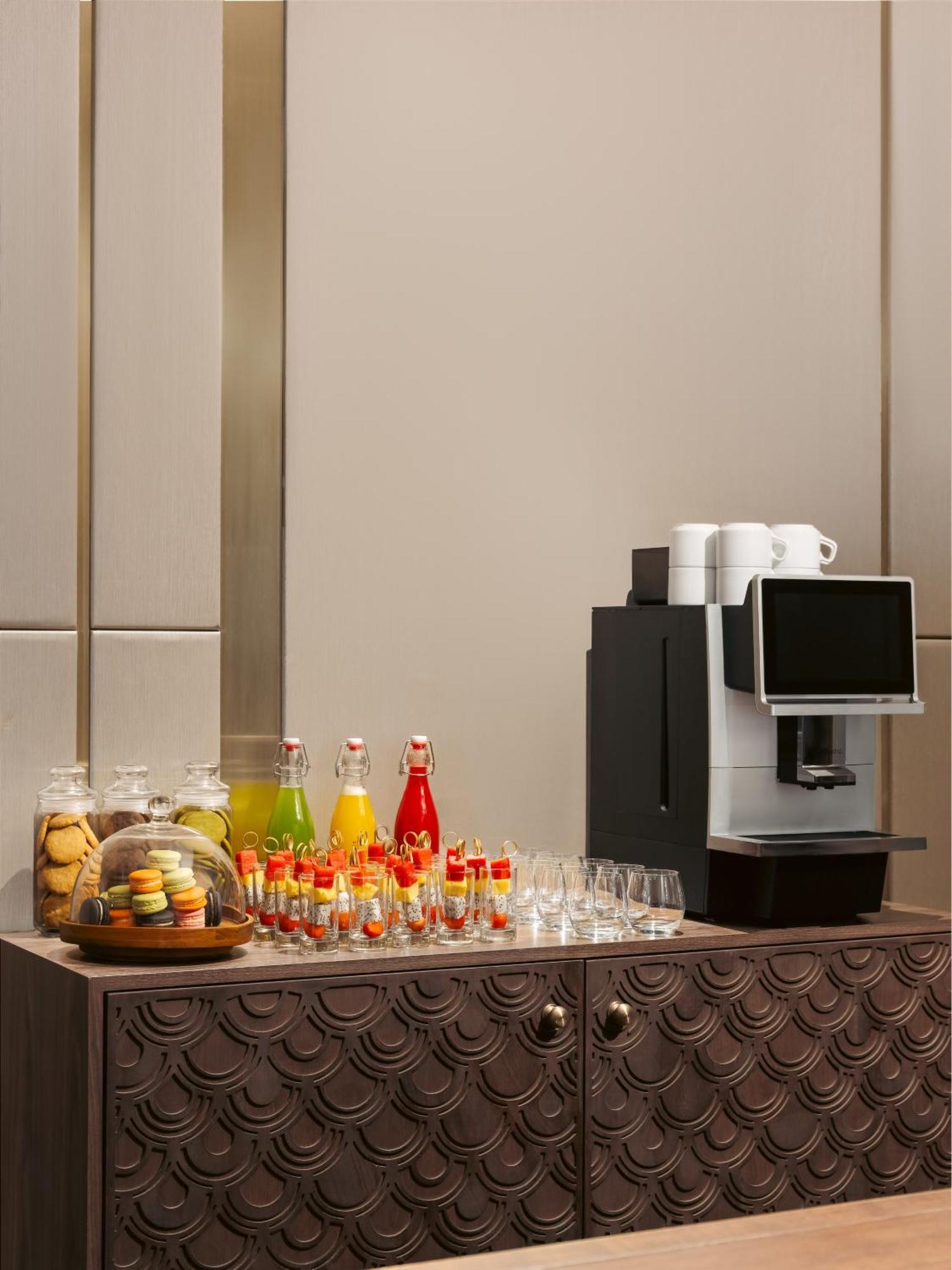Melia Vinpearl Hue Hotel Luaran gambar A coffee machine
